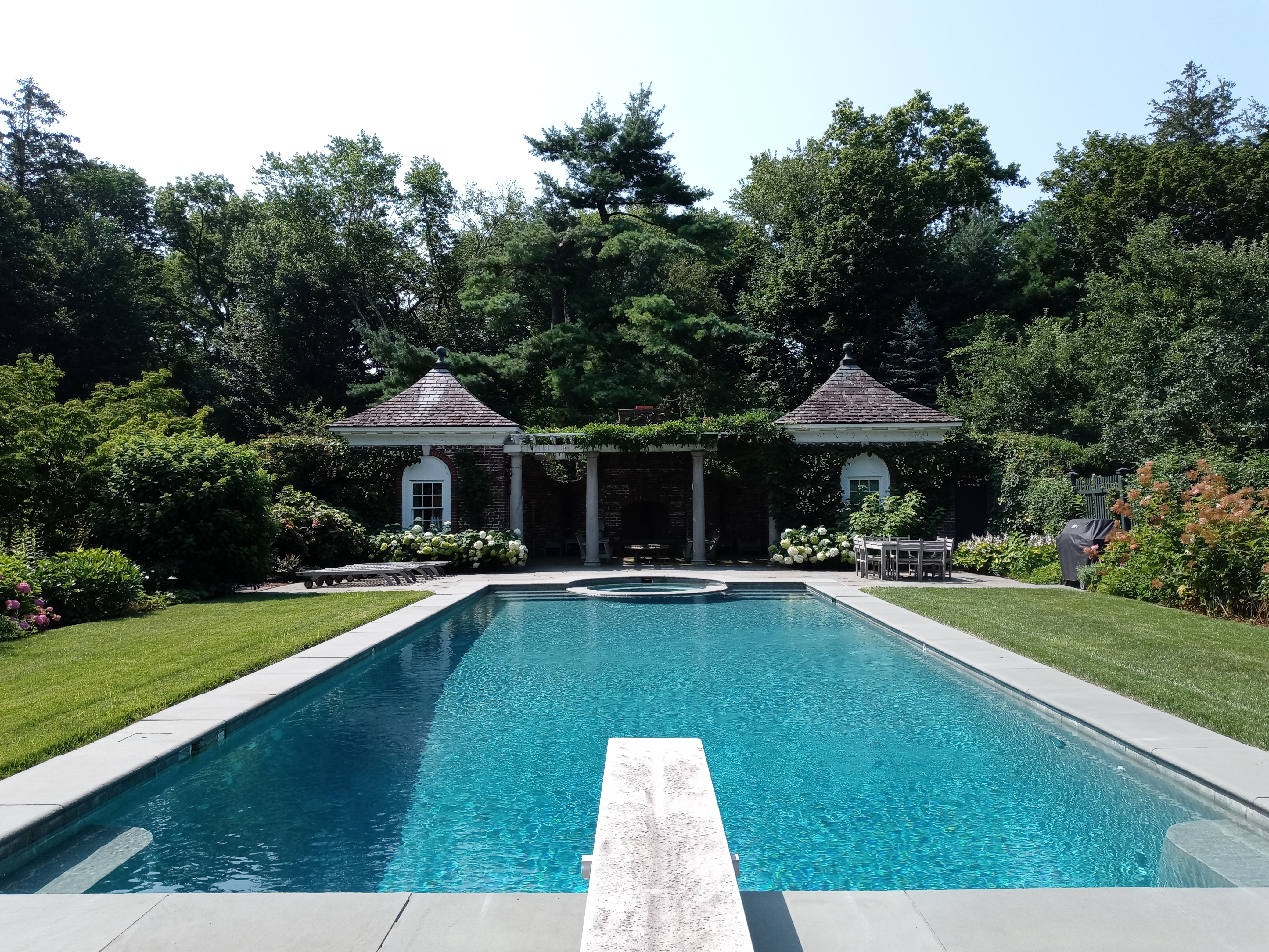 Immaculate estate property with pool house, hydrangeas, and organically maintained turf — Greenwich, CT